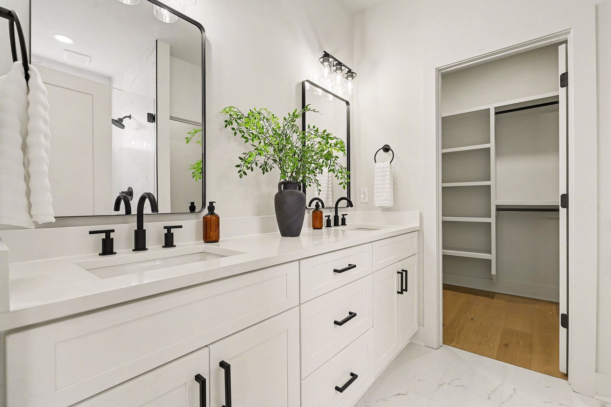3411 Hydes Ferry Road Nashville, TN 37218 - Photo 13 of 23 a bathroom with a sink double vanity and a mirror