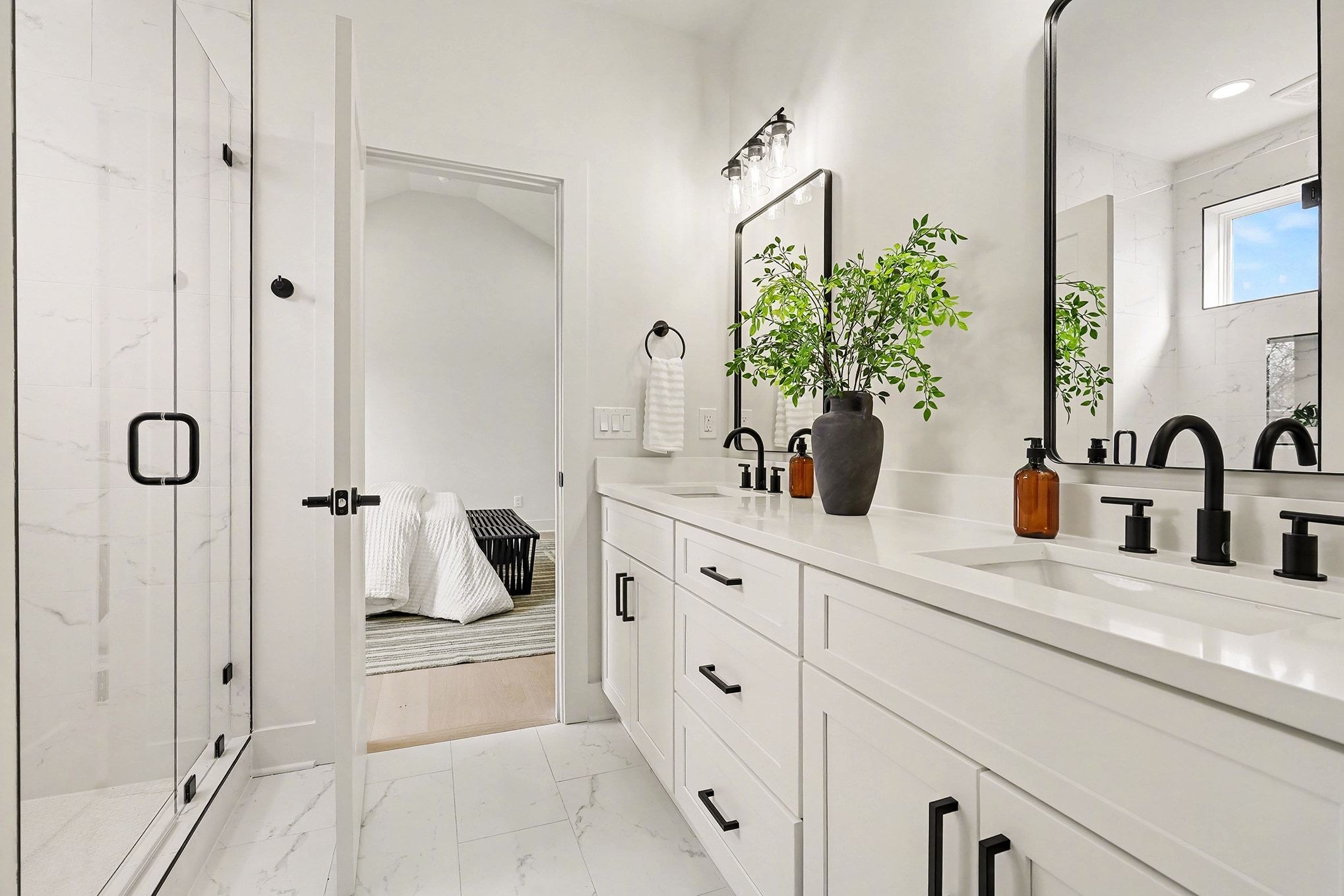 3411 Hydes Ferry Road Nashville, TN 37218 - Photo 14 of 23 a bathroom with a granite countertop sink a mirror and shower