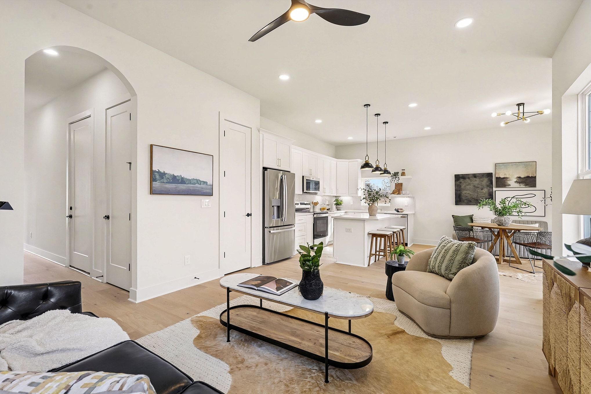 3411 Hydes Ferry Road Nashville, TN 37218 - Photo 5 of 23 a living room with furniture kitchen view and a chandelier
