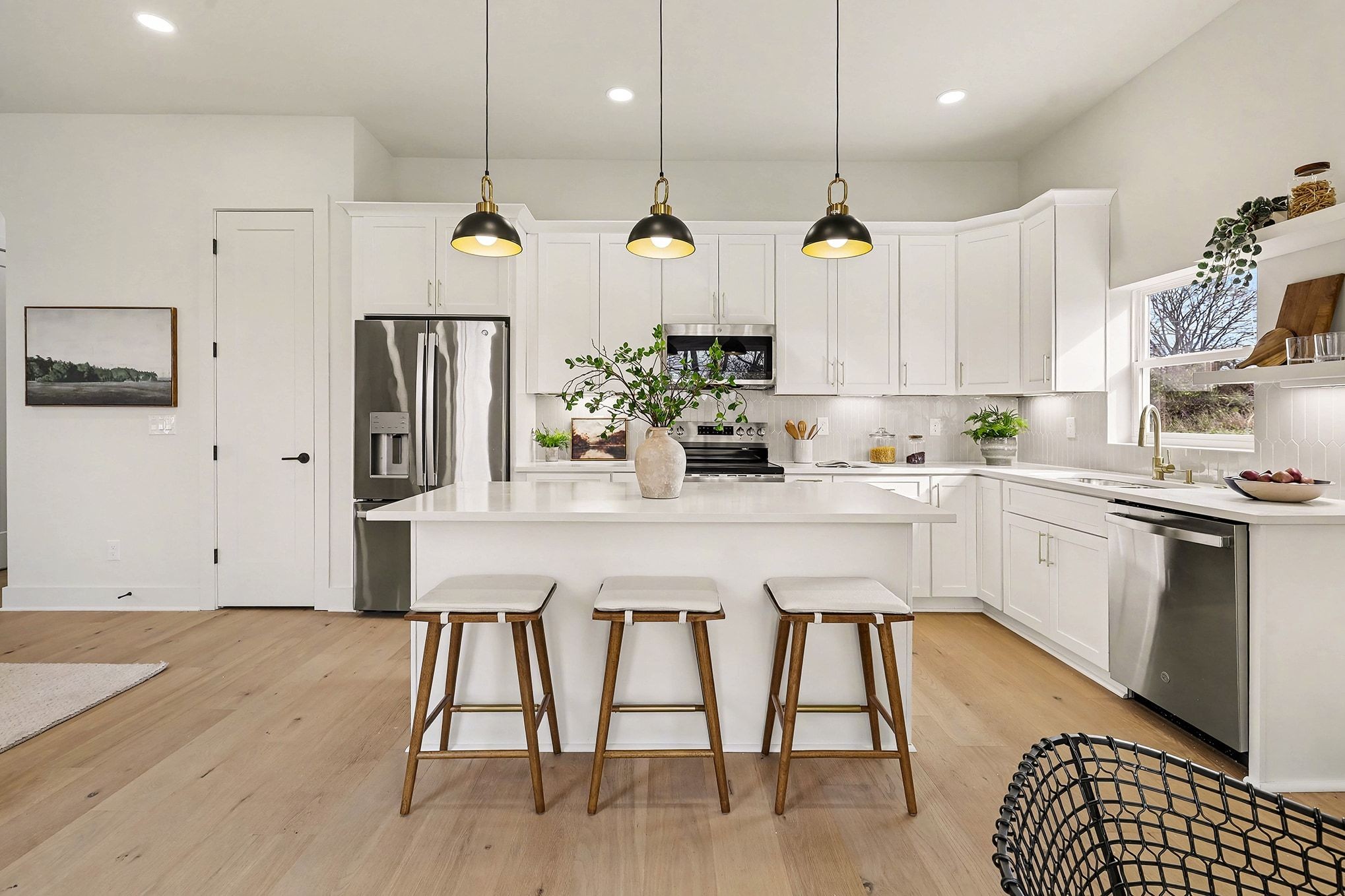 3411 Hydes Ferry Road Nashville, TN 37218 - Photo 7 of 23 a kitchen with kitchen island white cabinets and stainless steel appliances