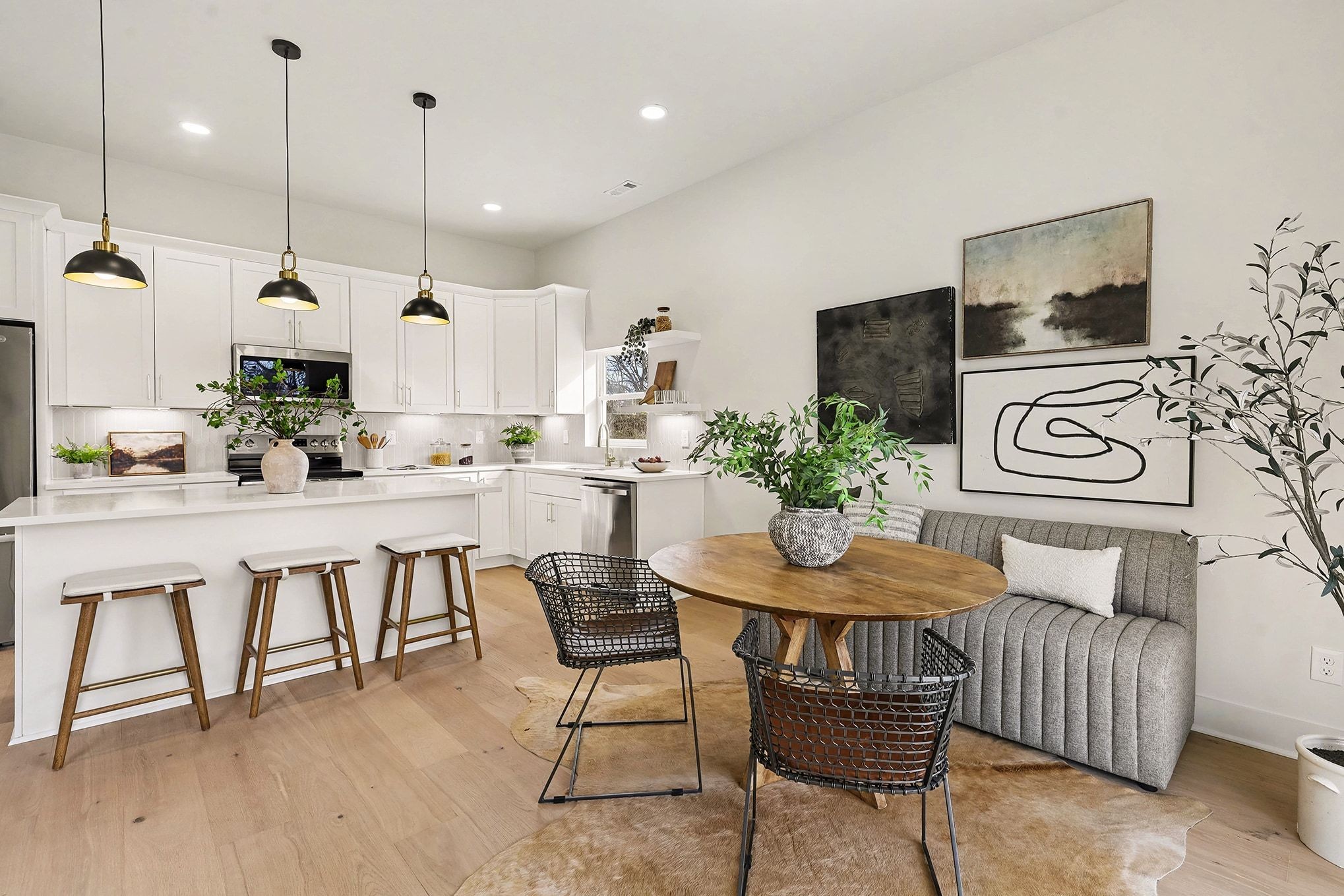 3411 Hydes Ferry Road Nashville, TN 37218 - Photo 10 of 23 a kitchen with a table chairs stove and cabinets