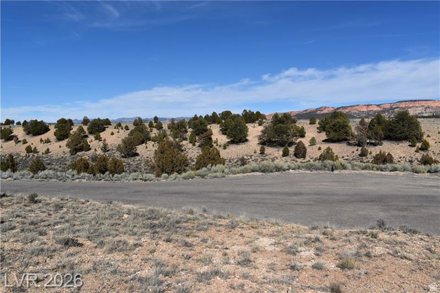 1825 Eagle Ridge Circle, Unit 15 Hatch, UT 84735 - Photo 27 of 33 View of mountain backdrop with rural landscape and a desert landscape