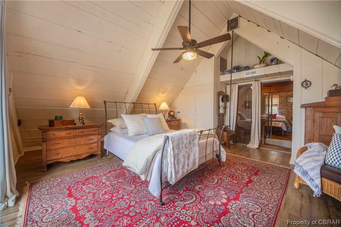 2515 Red Bank Road Gloucester, VA 23061 - Photo 38 of 49 Bedroom featuring wood-type flooring, lofted ceiling with beams, and ceiling fan