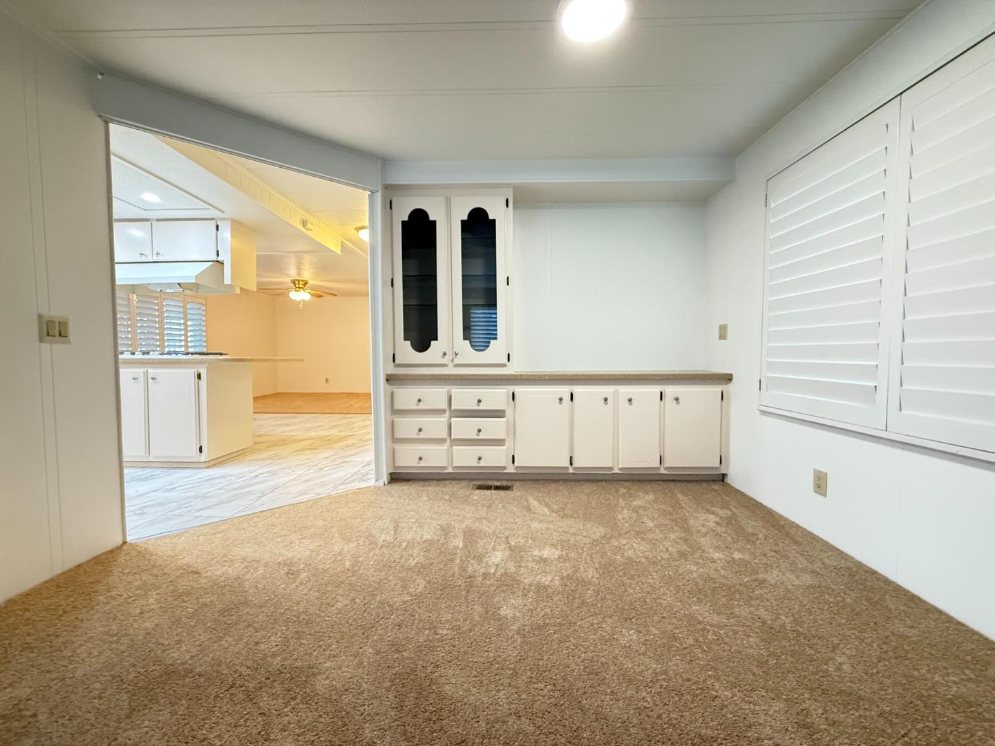 224 Queens Way, Unit 224 Pittsburg, CA 94565 - Photo 13 of 33 a view of a kitchen with a sink and cabinets
