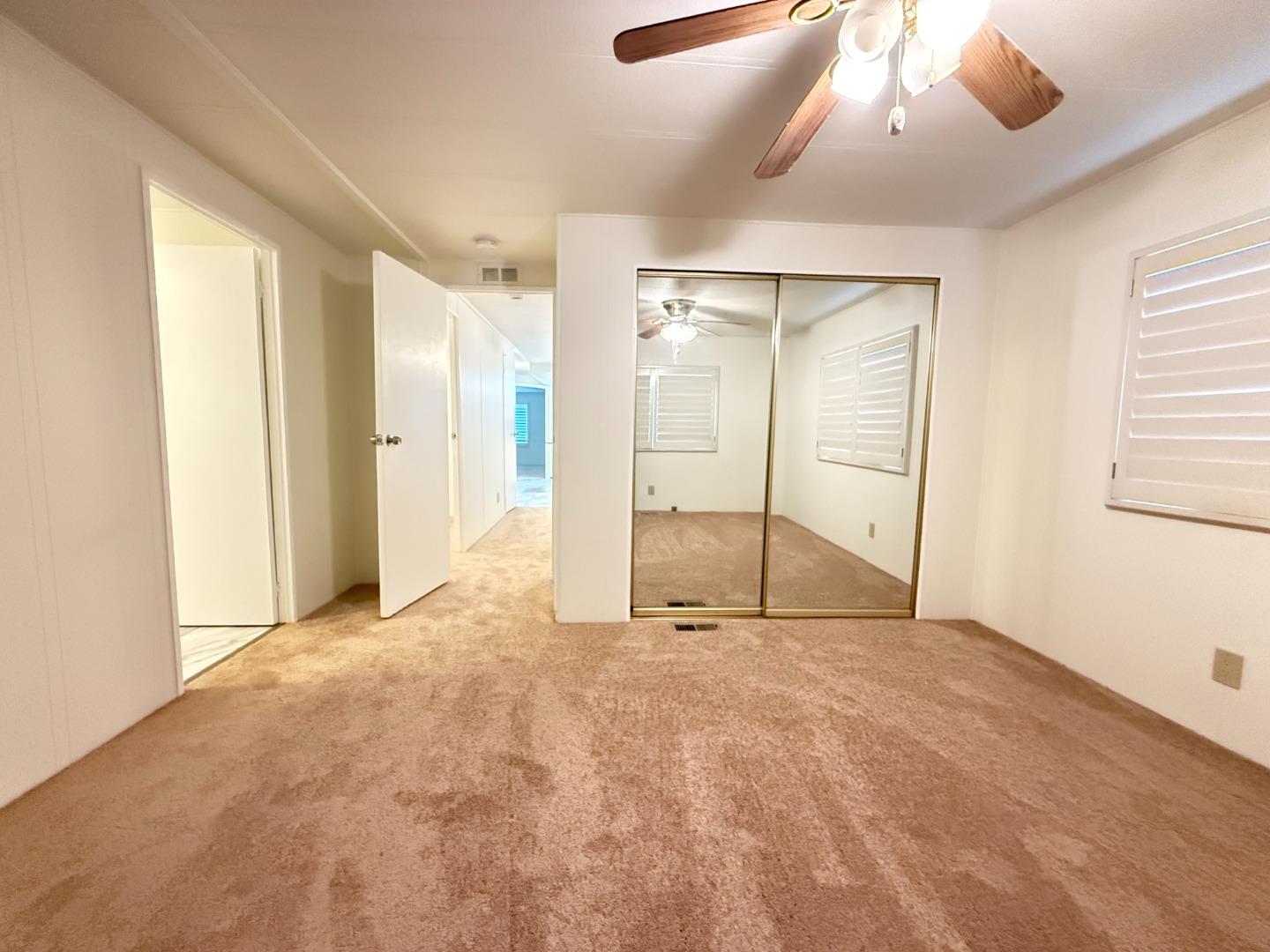 224 Queens Way, Unit 224 Pittsburg, CA 94565 - Photo 29 of 33 a view of an empty room with a window