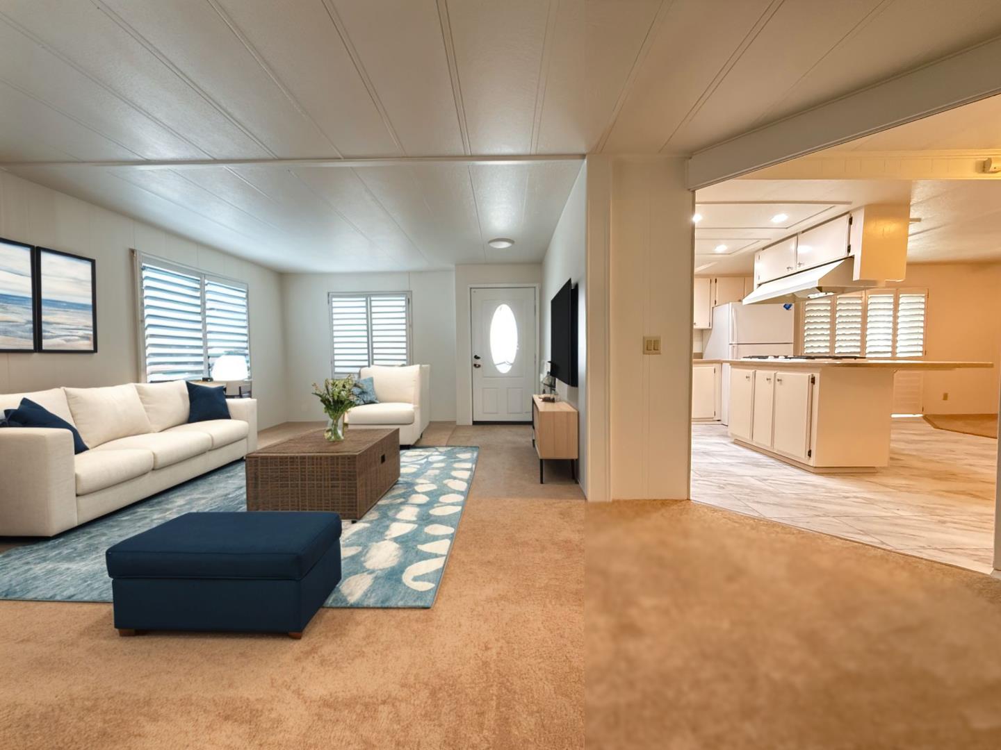 224 Queens Way, Unit 224 Pittsburg, CA 94565 - Photo 5 of 33 a living room with furniture and a large window