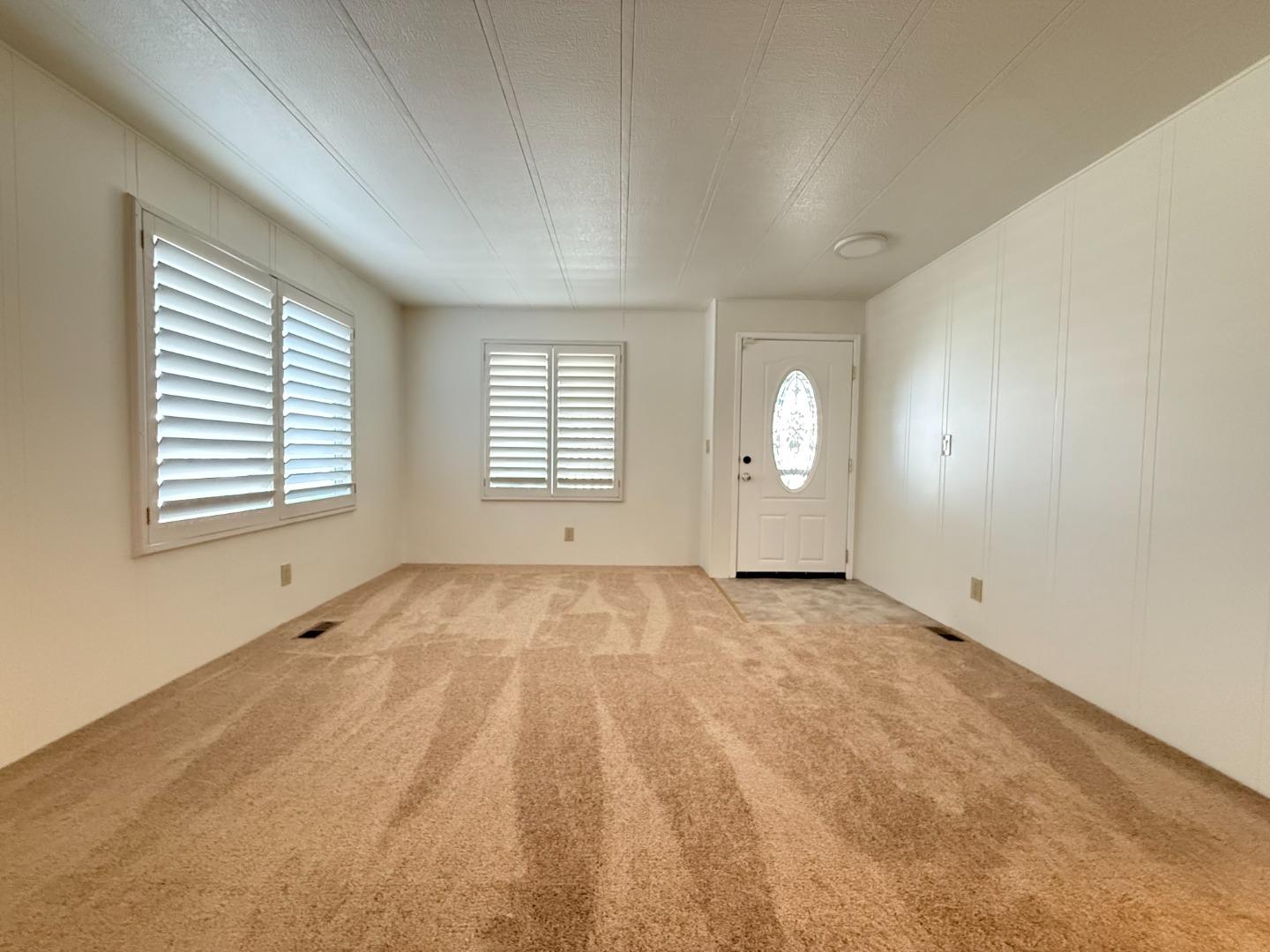 224 Queens Way, Unit 224 Pittsburg, CA 94565 - Photo 10 of 33 a view of an empty room with a window