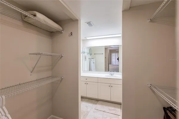 a view of cabinets and utility room