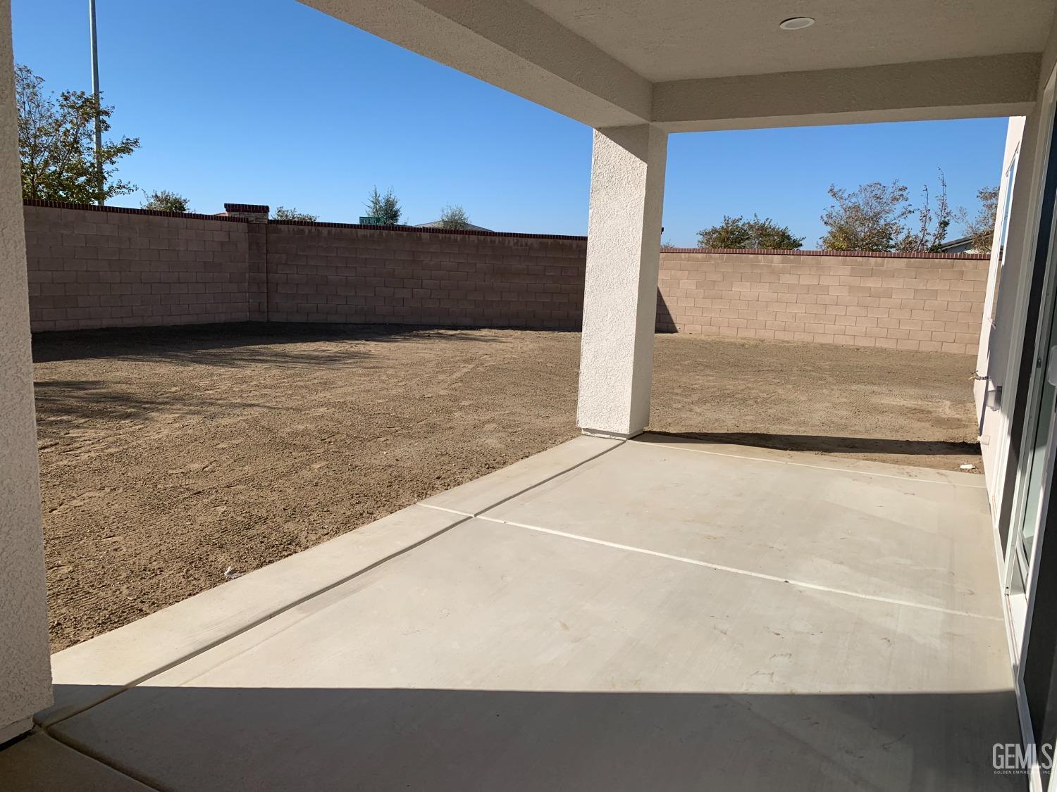 Undisclosed Address Bakersfield, CA 93314 - Photo 12 of 14 a view of wooden floor and a floor to ceiling window