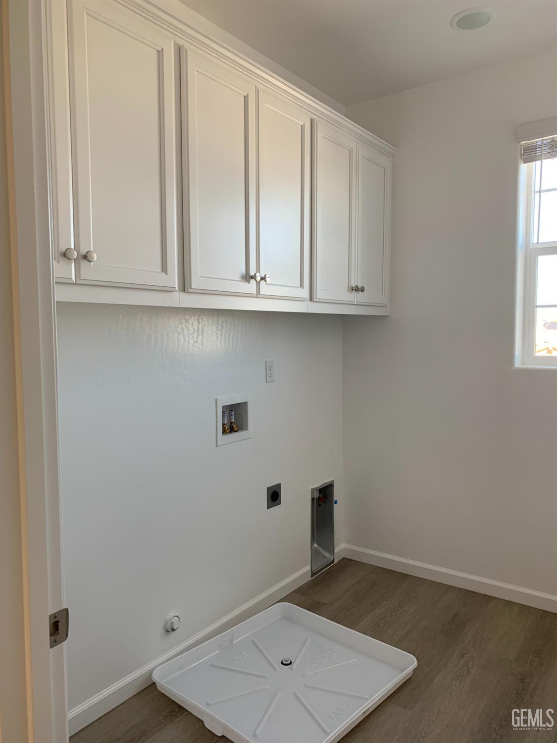 Undisclosed Address Bakersfield, CA 93314 - Photo 8 of 14 an empty room with cabinet