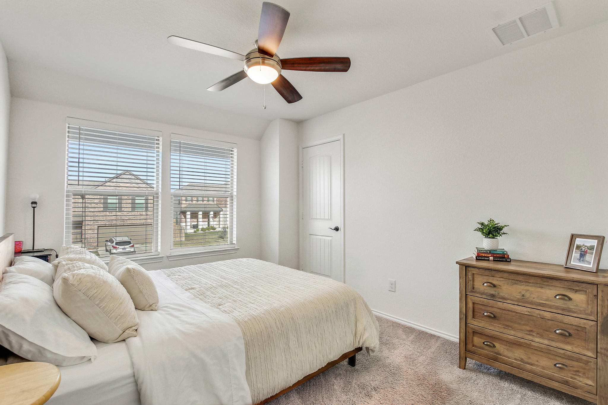 205 Travers Stake Trail Elgin, TX 78621 - Photo 21 of 28 Carpeted bedroom with baseboards and a ceiling fan