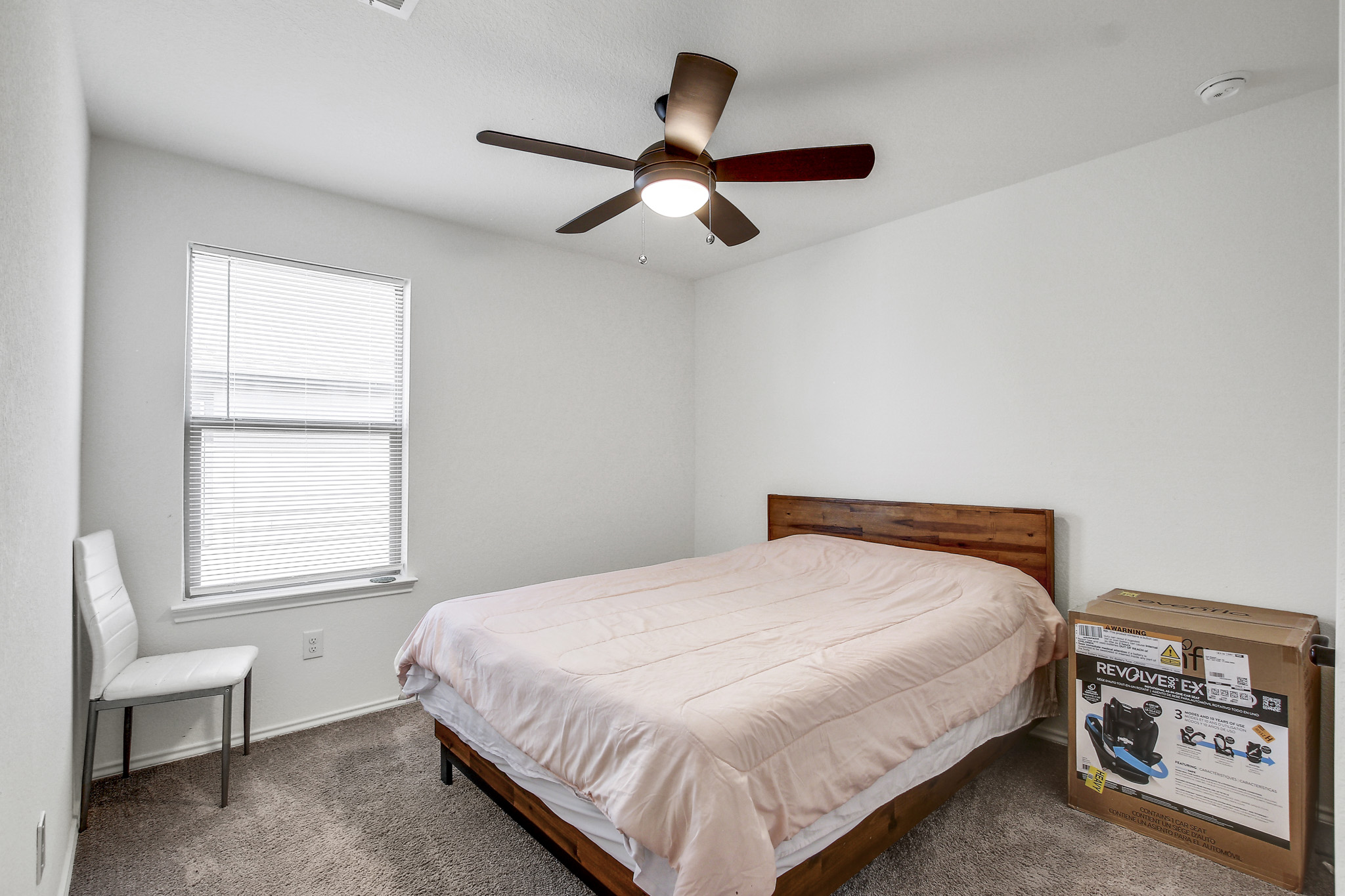 205 Travers Stake Trail Elgin, TX 78621 - Photo 24 of 28 Carpeted bedroom with ceiling fan