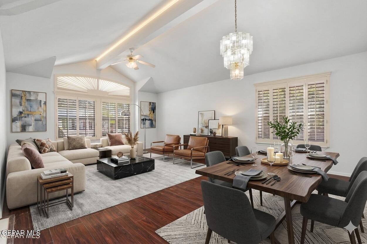 660 Rosinante Road El Paso, TX 79922 - Photo 18 of 43 a living room with furniture or couches and a dining table with wooden floor