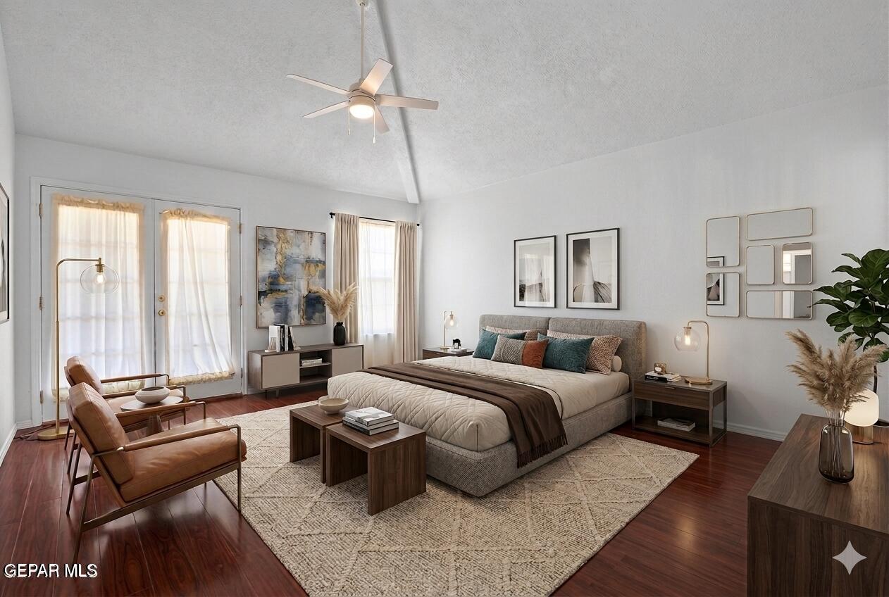 660 Rosinante Road El Paso, TX 79922 - Photo 27 of 43 a bedroom with a large bed and a couch