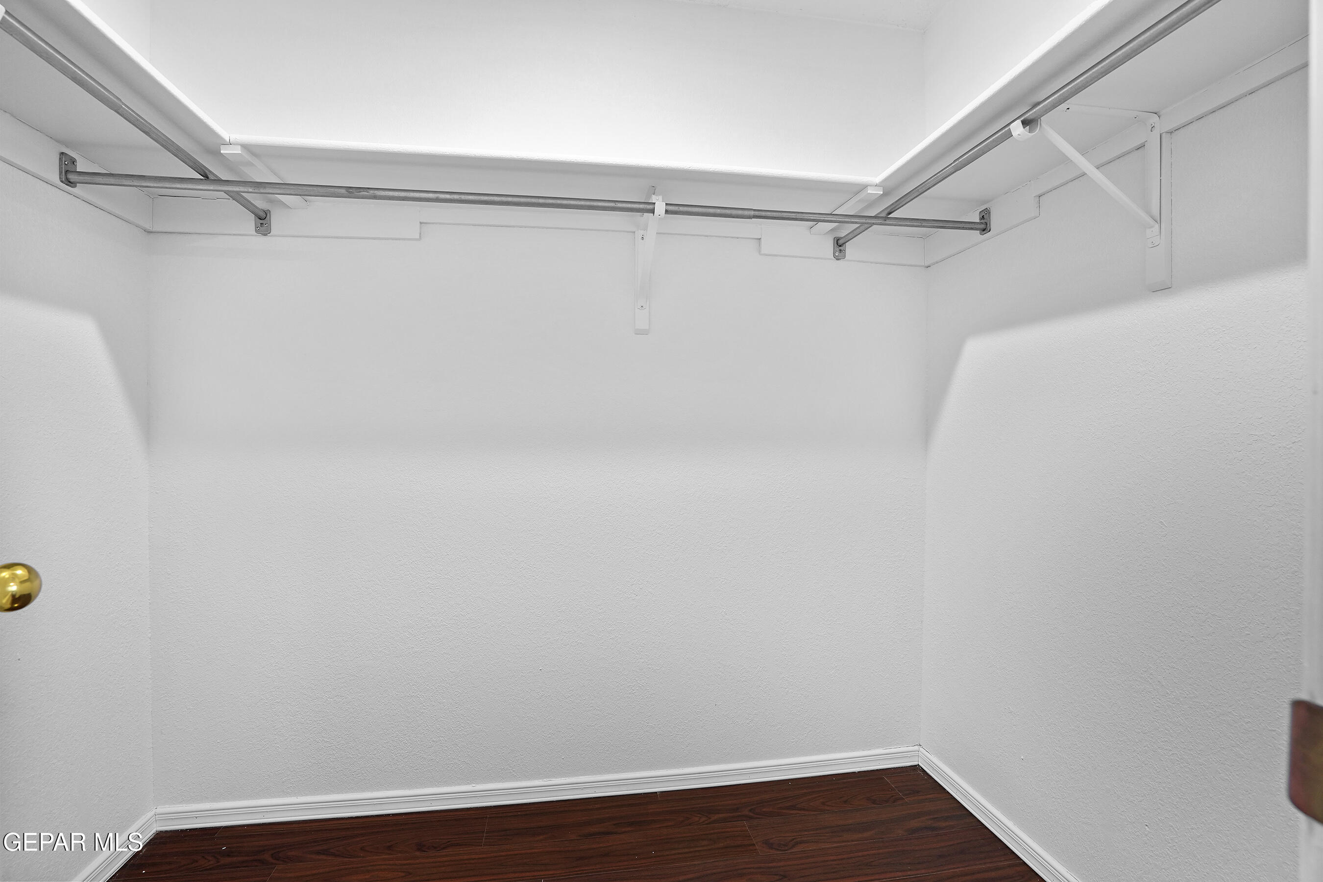 660 Rosinante Road El Paso, TX 79922 - Photo 29 of 43 a view of a room with racks on the wall