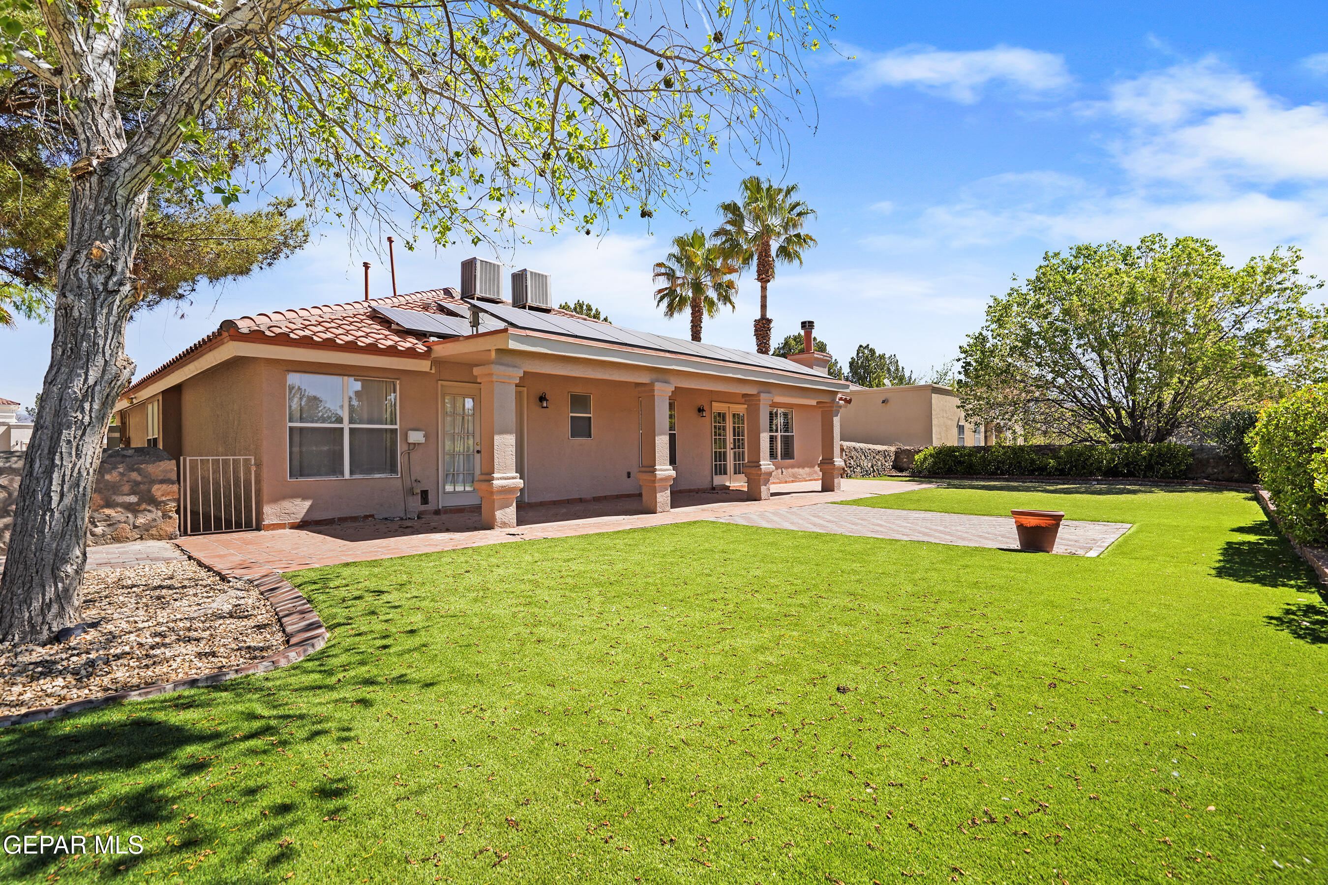 660 Rosinante Road El Paso, TX 79922 - Photo 34 of 43 a front view of a house with swimming pool having outdoor seating