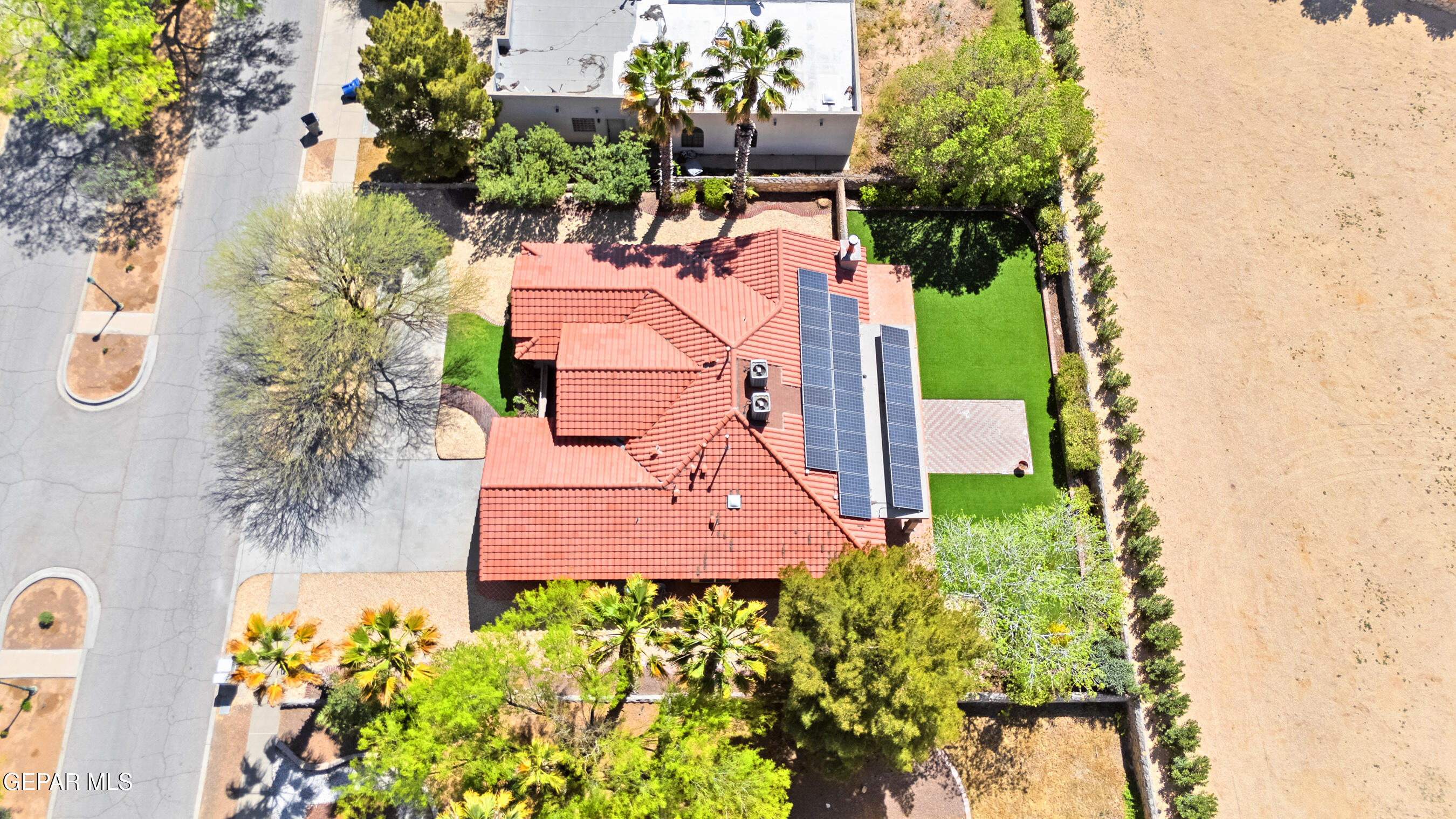 660 Rosinante Road El Paso, TX 79922 - Photo 39 of 43 an aerial view of a house with a yard and garden