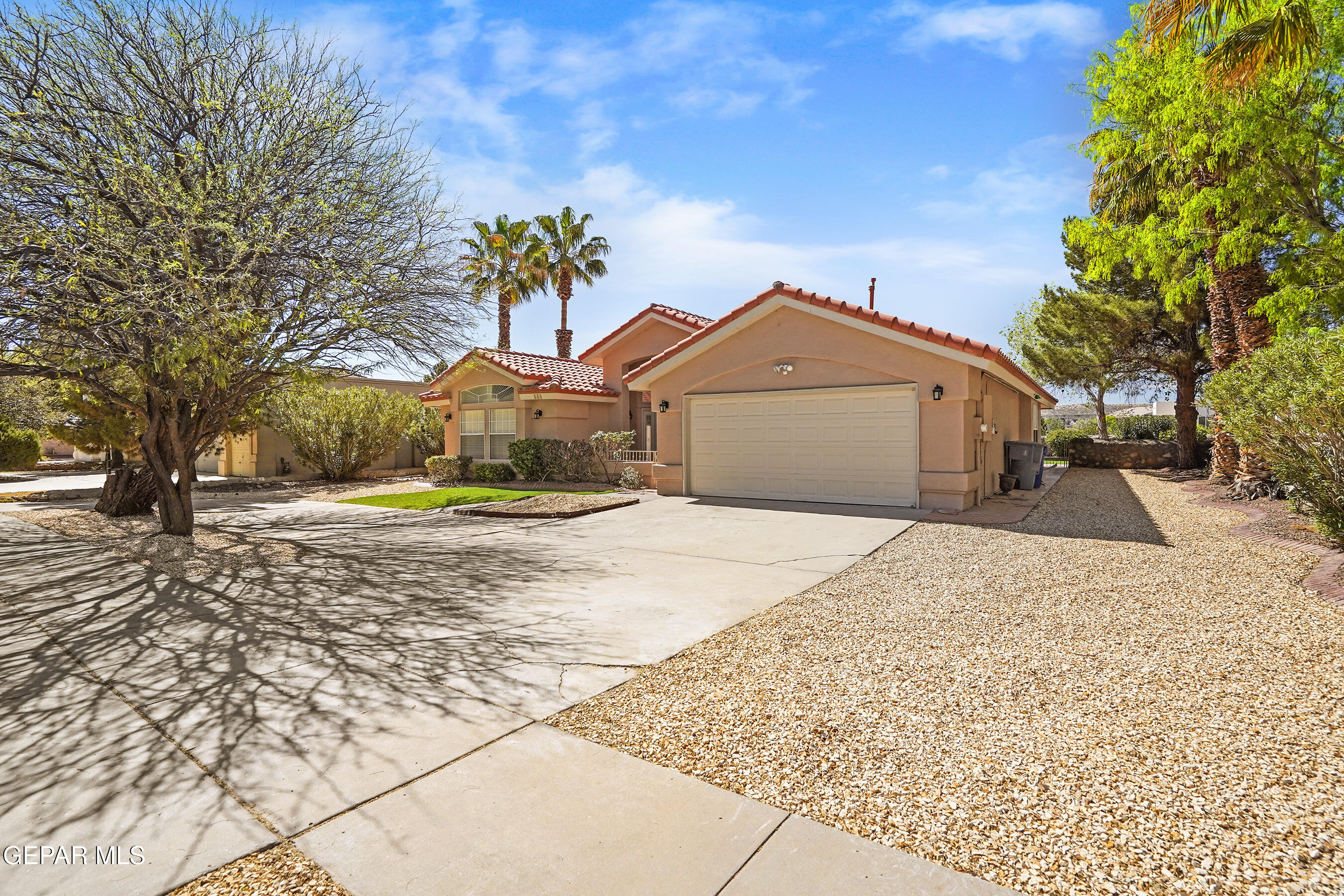 660 Rosinante Road El Paso, TX 79922 - Photo 43 of 43 a front view of a house with a yard