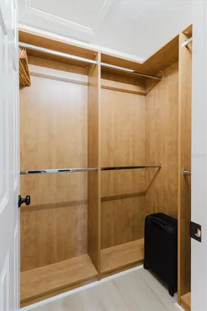 a bathroom with a shower and a mirror