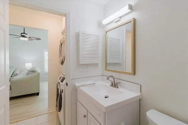 a bathroom with a sink toilet and tub