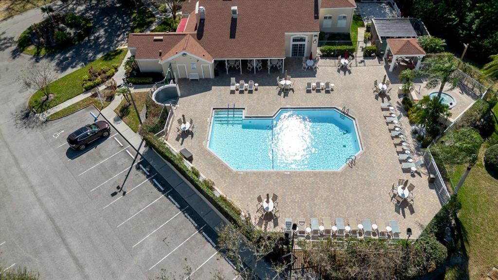 7807 Hardwick Drive, Unit 111 New Port Richey, FL 34653 - Photo 35 of 38 an aerial view of a house with a swimming pool and outdoor seating