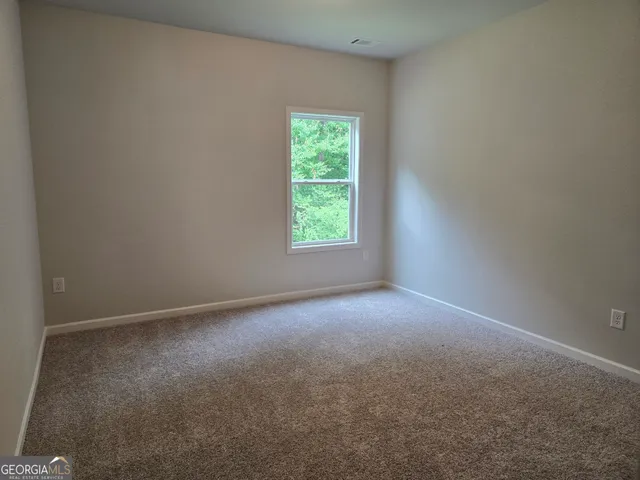 a view of a window in an empty room