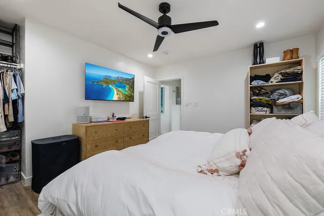 a bathroom with a sink a toilet and shower curtain