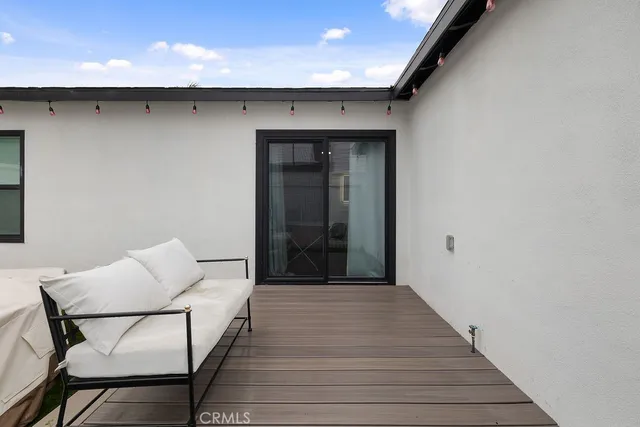 a kitchen with stainless steel appliances a sink and a refrigerator