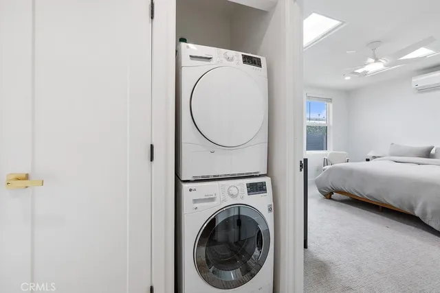 a living room with granite countertop furniture and a potted plant