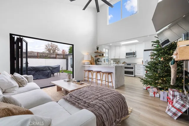an aerial view of a house with a yard basket ball court and a fountain
