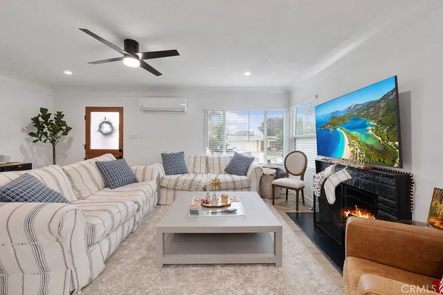 a kitchen with stainless steel appliances granite countertop a sink a stove top oven a counter space and cabinets