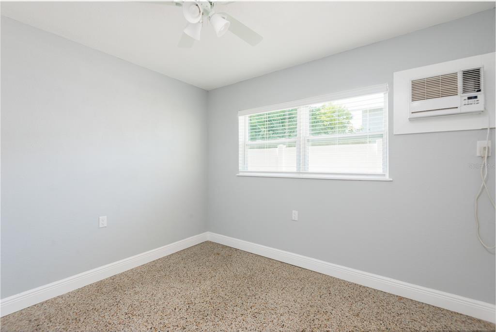 13248 4th Street East Madeira Beach, FL 33708 - Photo 12 of 47 an empty room with a window
