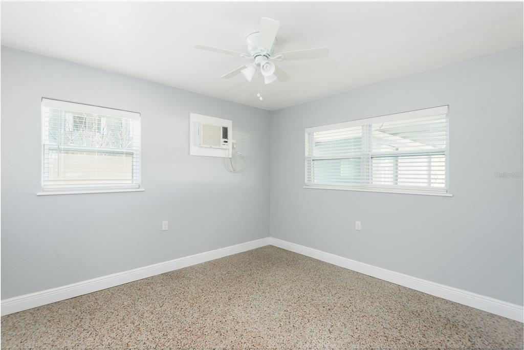 13248 4th Street East Madeira Beach, FL 33708 - Photo 15 of 47 an empty room with a window
