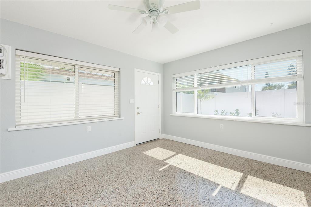 13248 4th Street East Madeira Beach, FL 33708 - Photo 19 of 47 an empty room with a window
