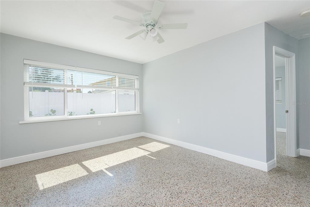 13248 4th Street East Madeira Beach, FL 33708 - Photo 20 of 47 an empty room with windows and closet