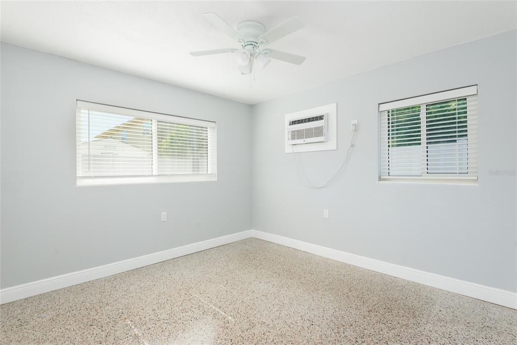 13248 4th Street East Madeira Beach, FL 33708 - Photo 25 of 47 an empty room with a window
