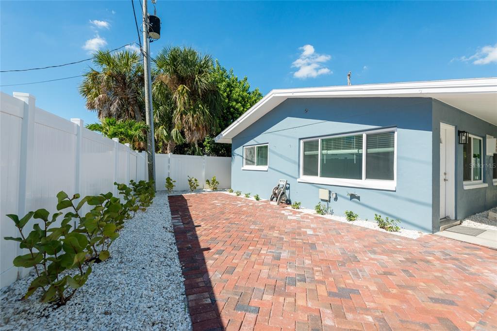 13248 4th Street East Madeira Beach, FL 33708 - Photo 32 of 47 a house view with a outdoor space