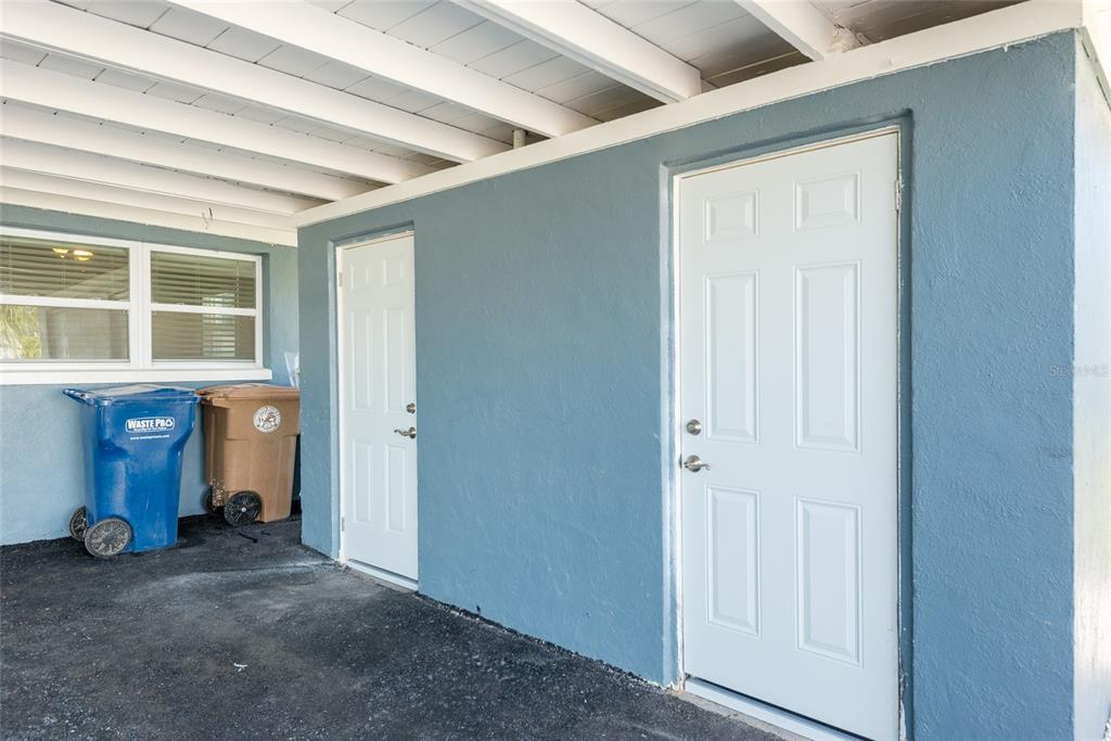 13248 4th Street East Madeira Beach, FL 33708 - Photo 34 of 47 an empty room with wooden floor and windows
