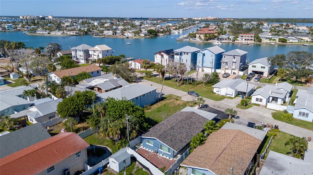 13248 4th Street East Madeira Beach, FL 33708 - Photo 39 of 47 an aerial view of residential houses with outdoor space