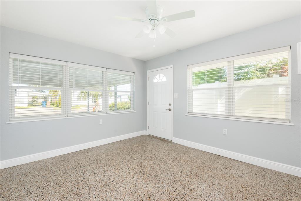 13248 4th Street East Madeira Beach, FL 33708 - Photo 6 of 47 a big room with windows and closet