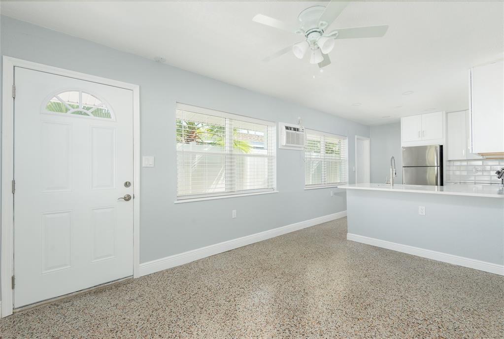 13248 4th Street East Madeira Beach, FL 33708 - Photo 8 of 47 a view of an empty room with a window