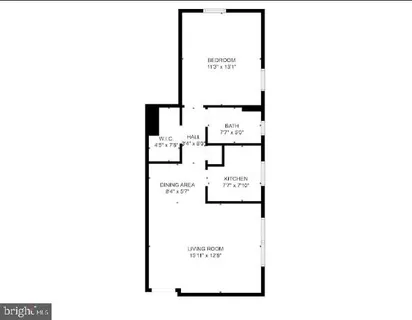 a picture of a bench in front of a wall