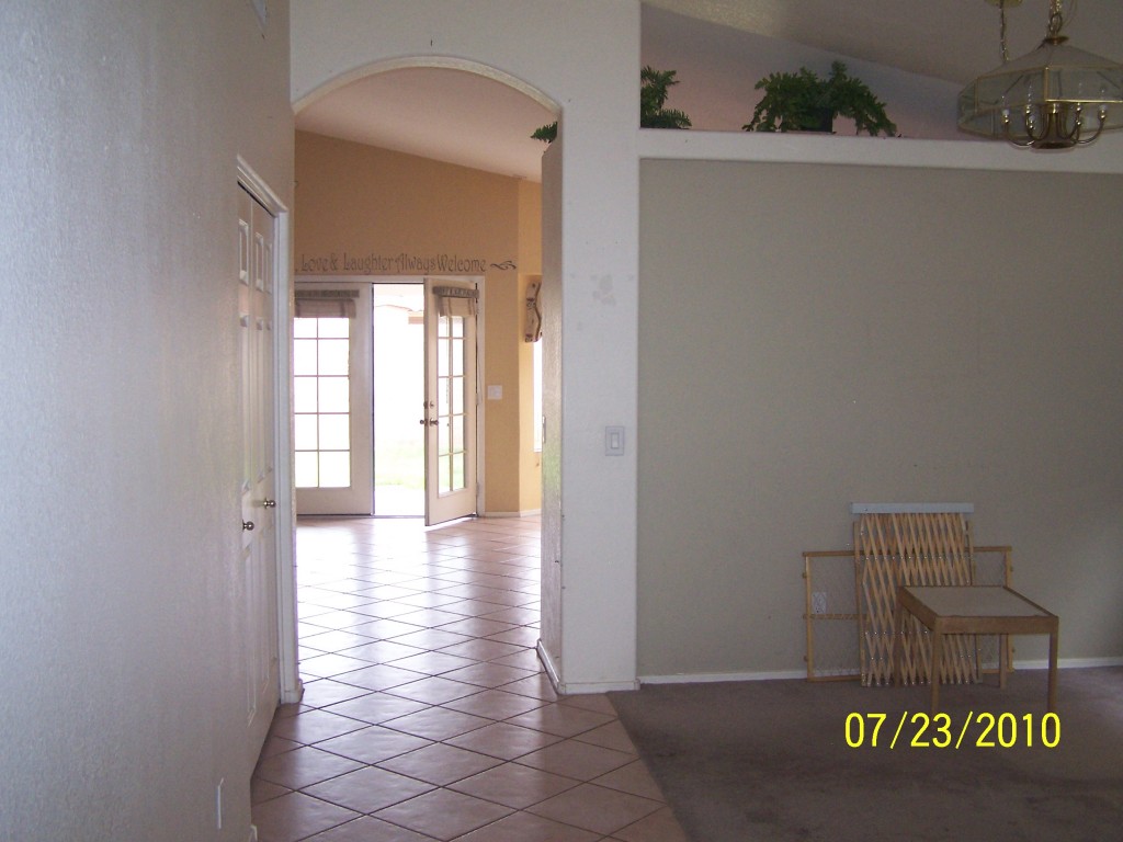 7658 West Calavar Road Peoria, AZ 85381 - Photo 8 of 23 looking into family room