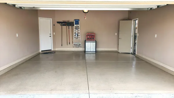 a view of a balcony with wooden floor