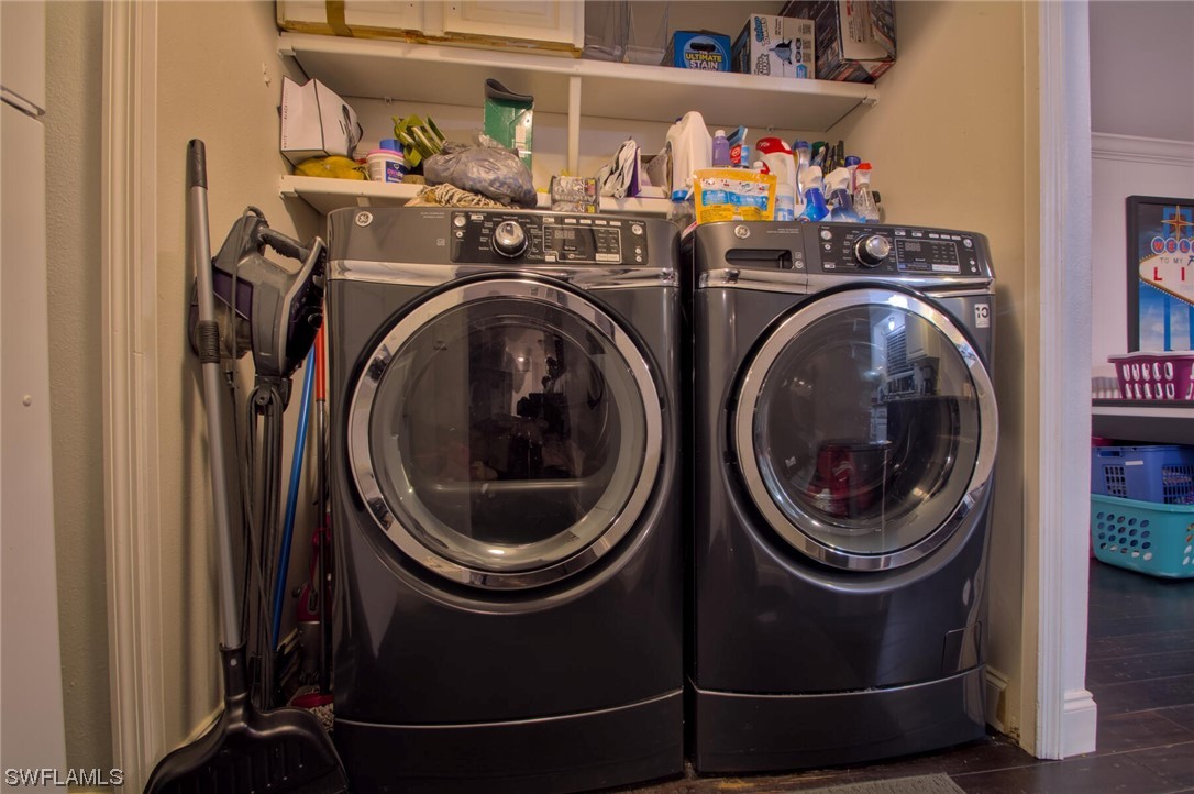 9180 Mandarin Road Fort Myers, FL 33967 - Photo 19 of 26 a utility room with dryer and washer