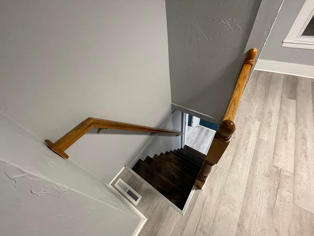 7 Coolidge Street Hudson, MA 01749 - Photo 15 of 40 a view of staircase with white walls