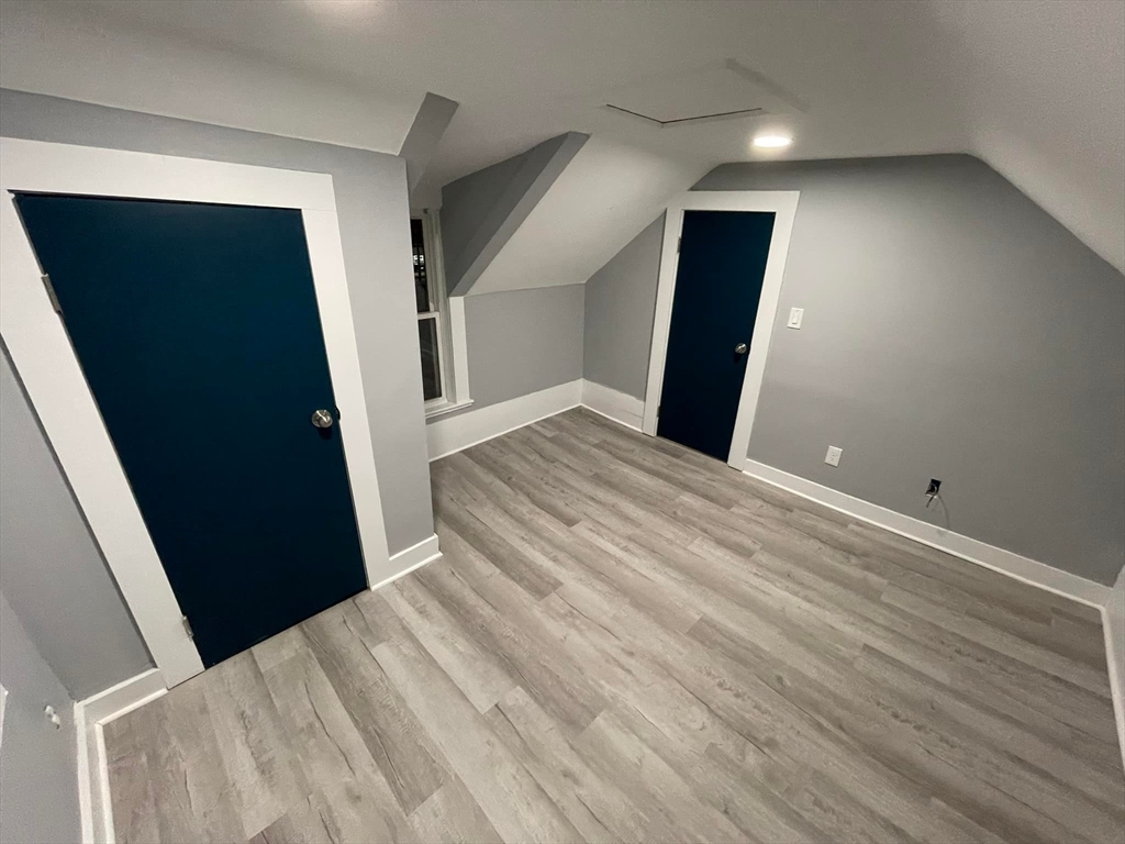 7 Coolidge Street Hudson, MA 01749 - Photo 19 of 40 a view of empty room with wooden floor