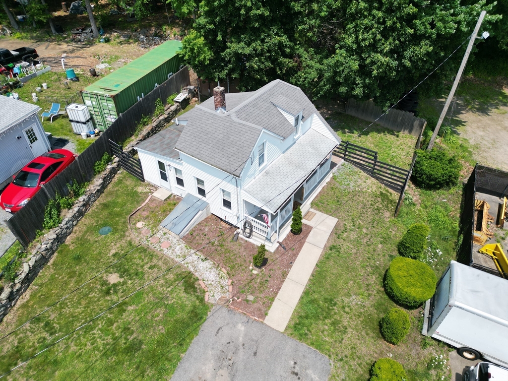 7 Coolidge Street Hudson, MA 01749 - Photo 2 of 40 an aerial view of a house with a yard