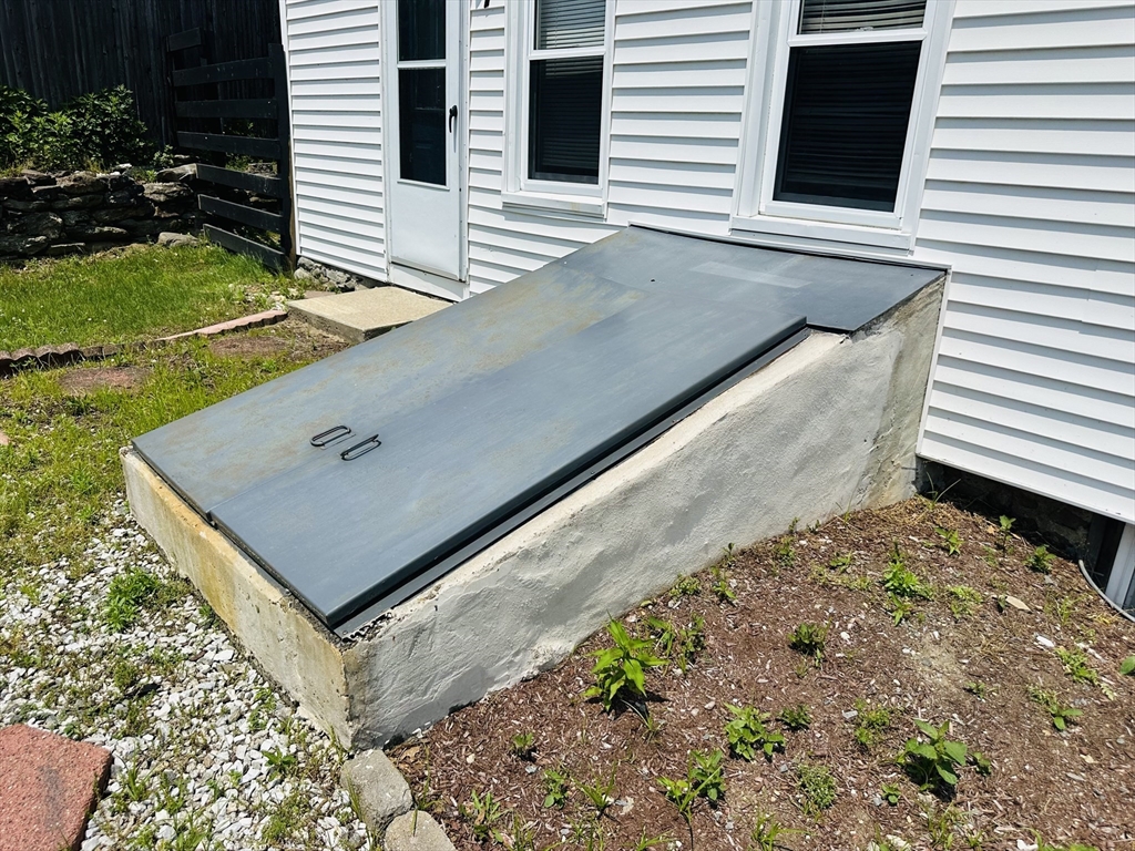 7 Coolidge Street Hudson, MA 01749 - Photo 22 of 40 a view of a back yard of the house