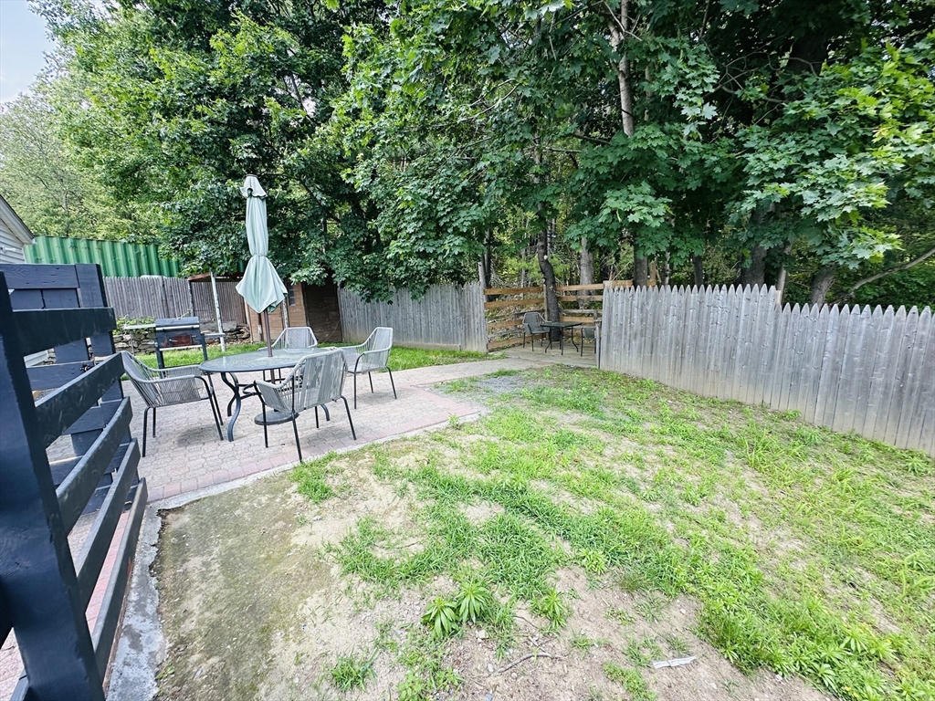 7 Coolidge Street Hudson, MA 01749 - Photo 27 of 40 a garden view with a seating space